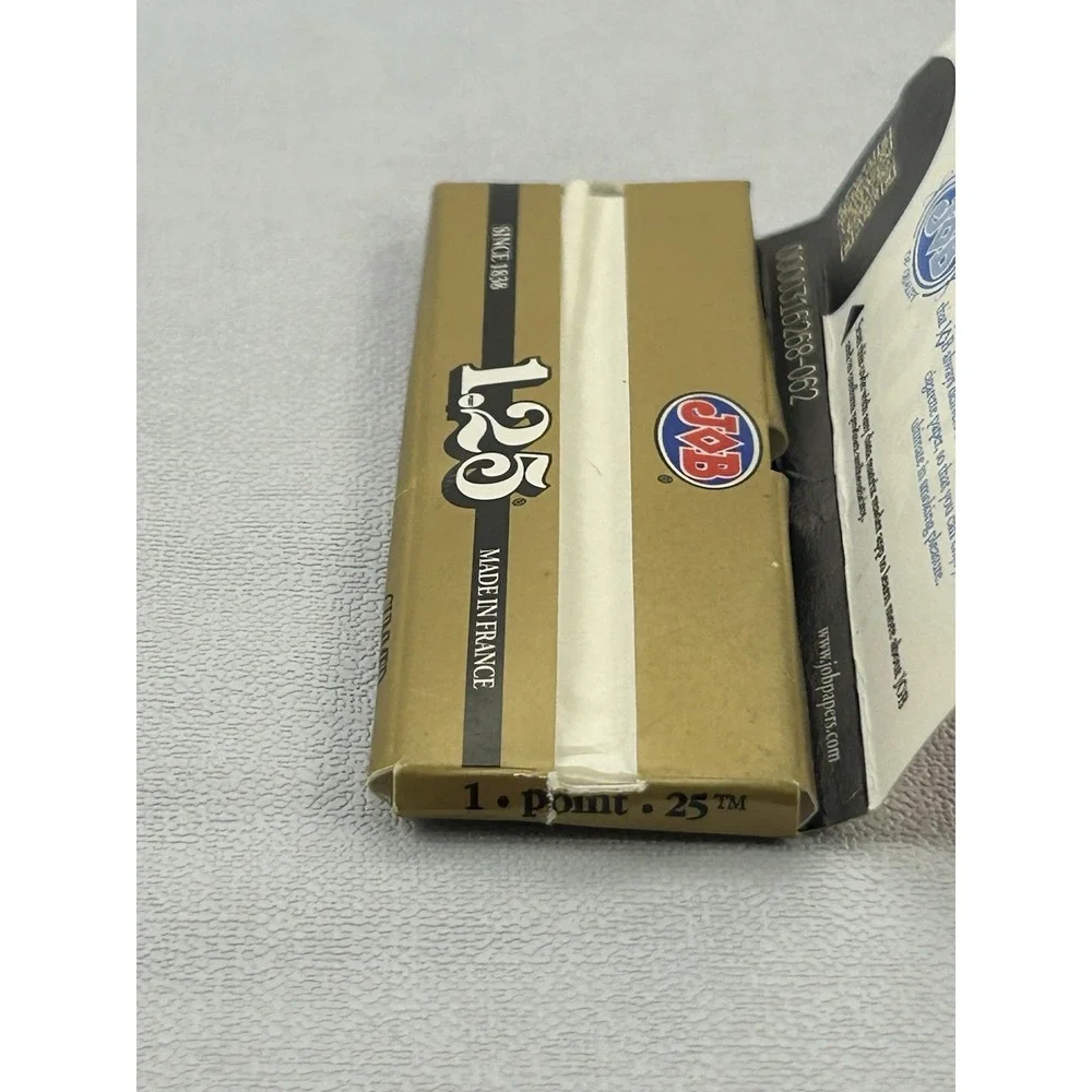 JOB 1.25 Rolling Papers Gold 24 Leaves Made in France Open Partial Pack